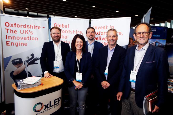 OxLEP team in front of event banners at Venturefest 2019