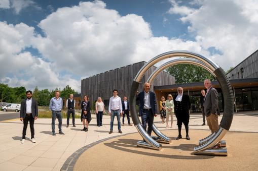 Image of key stakeholders outside at the opening of the Wood Centre for Innovation